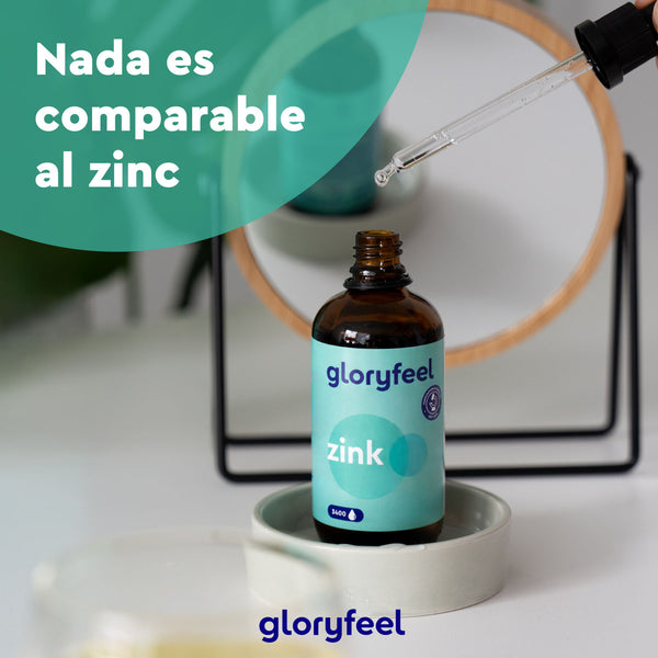 Un frasco con gotero etiquetado como &quot;Zinc en gotas&quot; de GloryFeel GmbH España resalta la importancia del zinc. El texto &quot;Nada es comparable al zinc&quot; aparece junto a un gotero, con un elemento decorativo circular al fondo, que presenta este suplemento esencial de zinc.