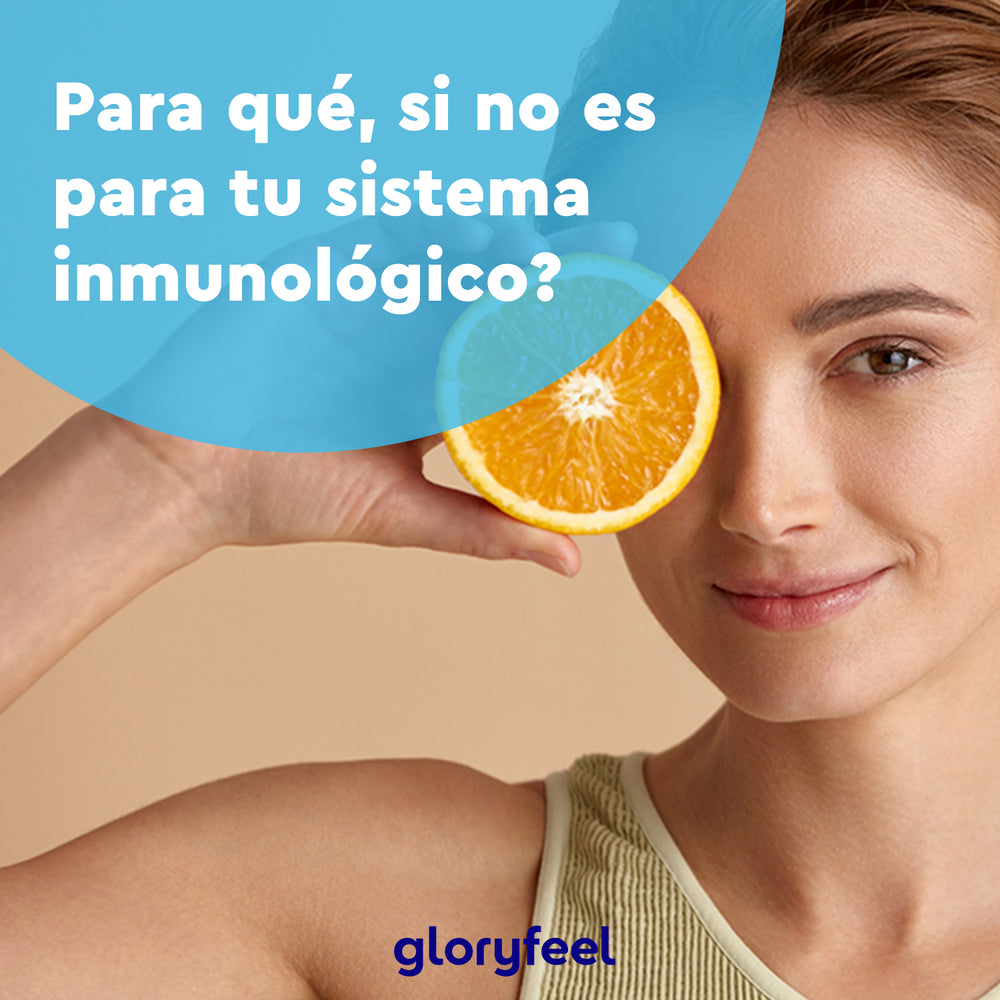 Una persona sostiene media naranja junto al ojo con el texto en español: &quot;Vitamina C + Zinc, ¿para qué? Para tu sistema inmunológico&quot;, con el logotipo de GloryFeel GmbH España.