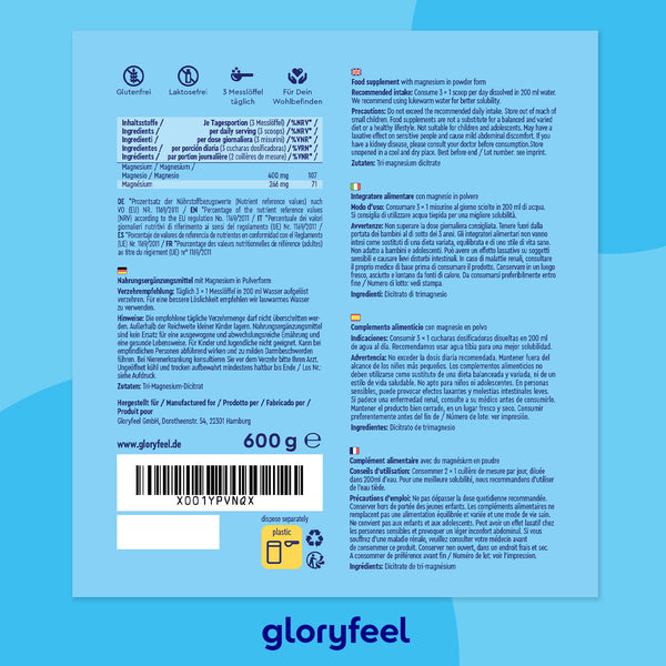 Envase azul de suplemento con texto multilingüe, información nutricional, código de barras y URL del sitio web. Contiene 600 g de &quot;Magnesio en polvo&quot; de gloryfeel GmbH España; etiquetado como sin gluten, sin lactosa y sin azúcar.