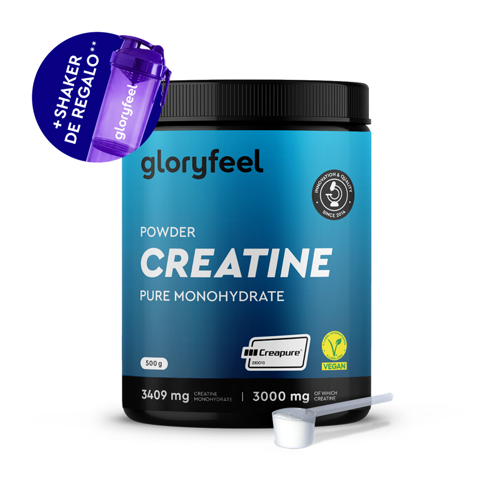 Un envase de Creatina en polvo de gloryfeel GmbH España incluye un cacito y un agitador morado de regalo con la etiqueta &quot;+ Shaker de regalo.