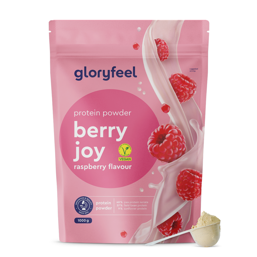 Bolsa rosa con Proteina Berry Joy - Sabor a frambuesa de gloryfeel GmbH España. La etiqueta muestra &quot;berry joy&quot; y &quot;vegano&quot;, con una cucharada de polvo en primer plano.