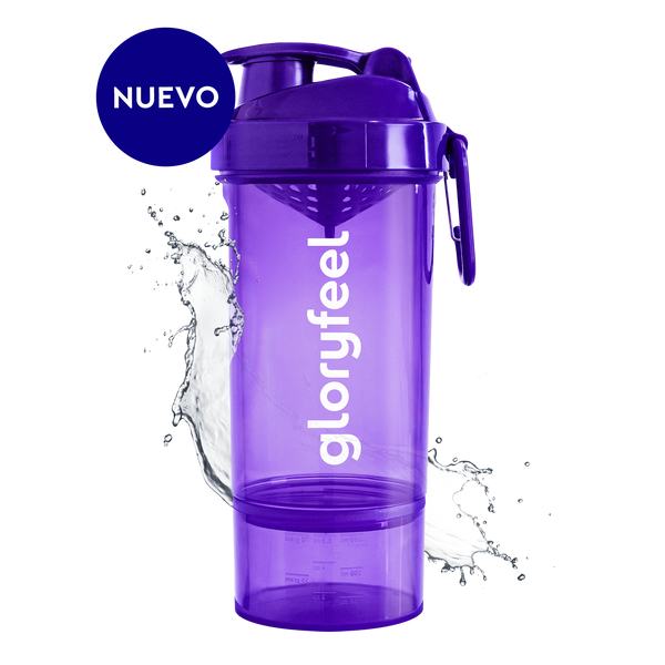 Botella mezcladora morada con el logotipo de gloryfeel GmbH España y una salpicadura de agua. El texto &quot;NUEVO&quot; en un círculo azul cerca de la parte superior.