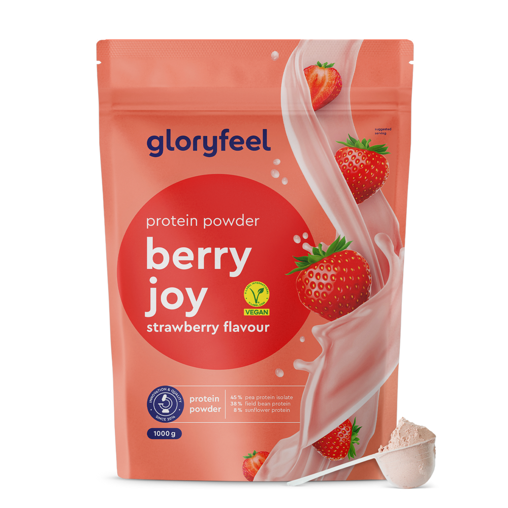 Una bolsa rosa de Proteina Berry Joy de gloryfeel GmbH España con sabor a fresa, que muestra fresas y un símbolo vegano, con una bola al lado.
