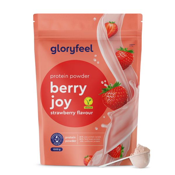 Una bolsa rosa de Proteina Berry Joy de gloryfeel GmbH España con sabor a fresa, que muestra fresas y un símbolo vegano, con una bola al lado.