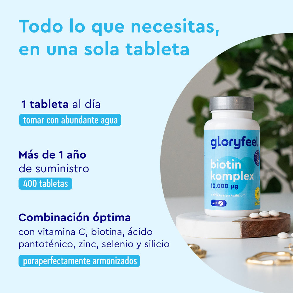 Una botella de Biotina Complex de gloryfeel GmbH España se encuentra sobre una superficie de madera, resaltando la ingesta diaria con un suministro de 400 comprimidos para un año y una combinación óptima con vitaminas y minerales esenciales como la vitamina B para una mejor salud del cabello.