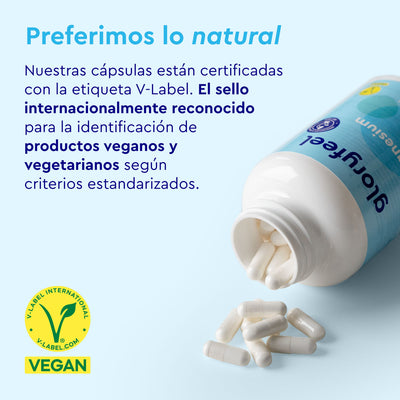 Una botella de Dicitrato de Trimagnesio de GloryFeel, con cápsulas blancas sobre una superficie azul, está certificada vegana con la etiqueta V, lo que enfatiza la biodisponibilidad de su magnesio para una absorción óptima.