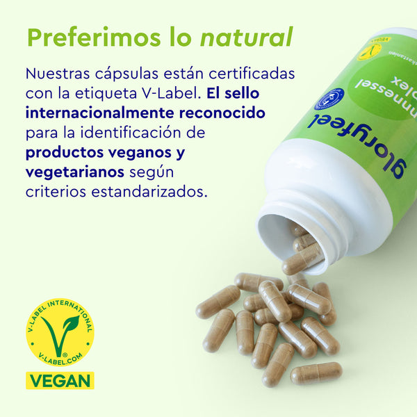 Una botella con la etiqueta &quot;gloryfeel GmbH España Cápsulas de Ortiga&quot; derrama cápsulas junto a un texto que resalta su certificación V-Label para productos veganos y vegetarianos.