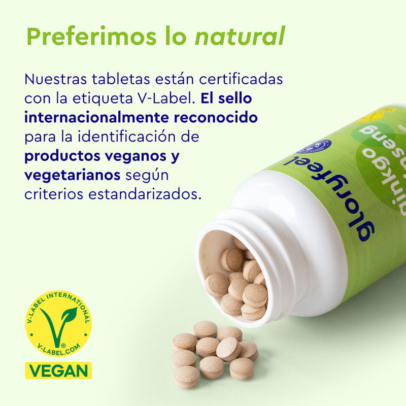 Una botella de Tabletas de Ginkgo Ginseng de gloryfeel GmbH España incluye un texto en español que promociona la certificación V-Label para productos veganos y vegetarianos. La etiqueta verde "VEGAN", con el logotipo, indica ingredientes naturales como el Ginkgo Biloba, inspirados en los principios de la medicina tradicional china.